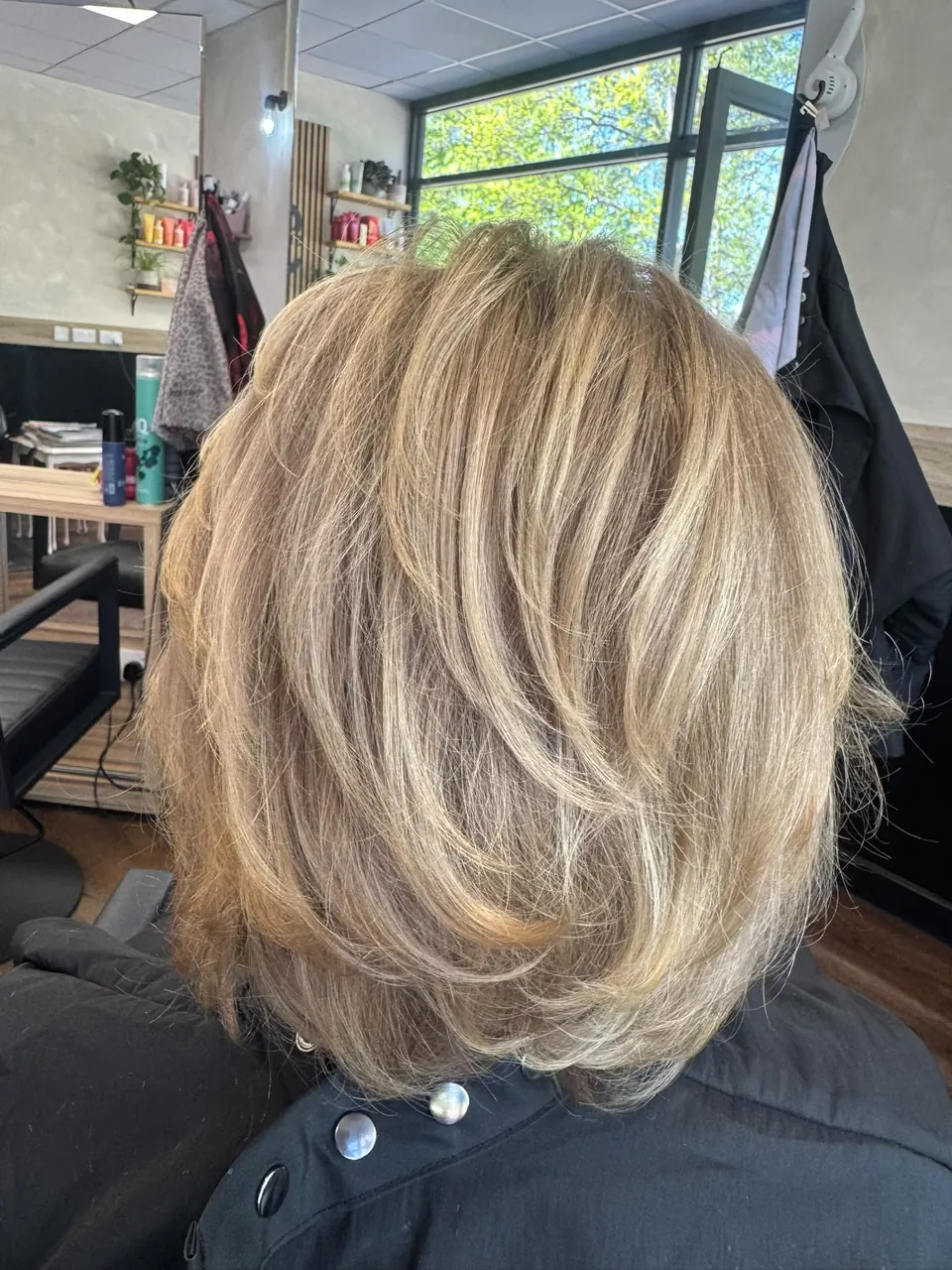 Layered blonde bob with a smooth, full finish